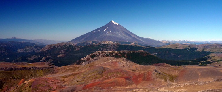 The fabulous Lanín volcano, with an eroded subglacial-emergent flank eruption from Quetrupillán in the foreground (red material - oxidised).